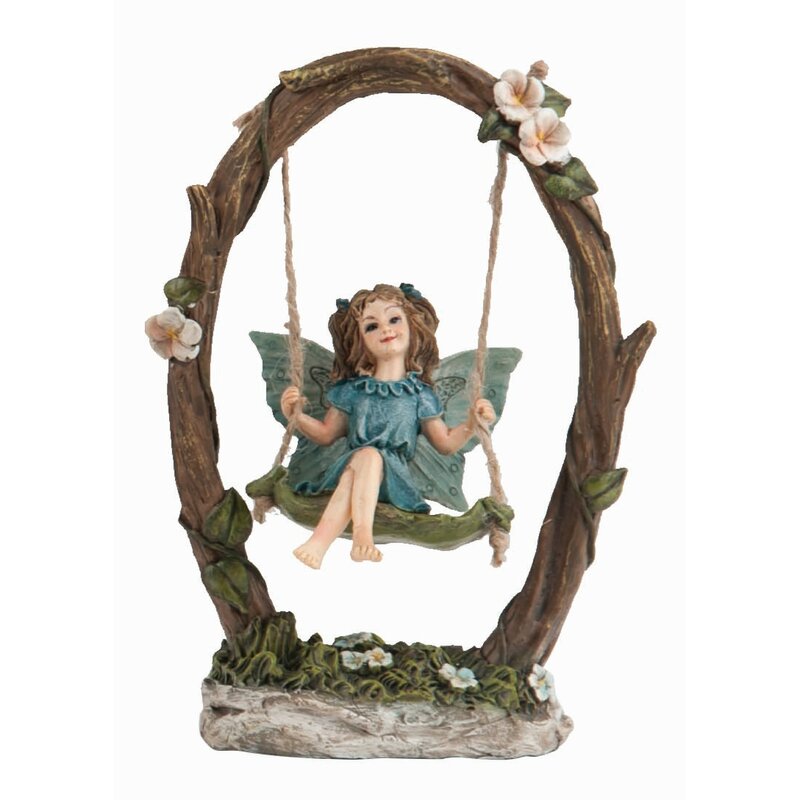 fairy on a swing figurine